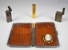 Three Dunhill lighters, pinchbeck cameo brooch and a hallmarked silver mounted case PLEASE NOTE WE