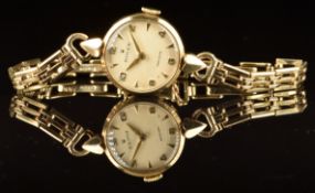 Rolex 9ct gold ladies wristwatch with gold hands, Arabic numerals and hour markers, cream dial and