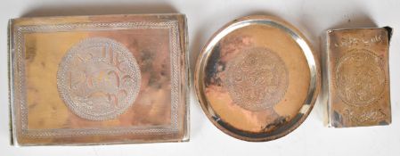 Sudanese silver cigarette case, together with a similar match box holder and a pin dish, both with