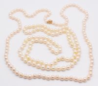 Two single strands of cultured pearls, one with 18ct gold clasp, 88 & 86cm