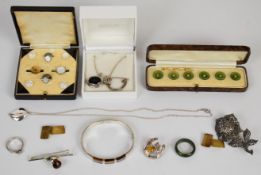 A collection of silver including bangle set with tiger's eye, brooch set with marcasite, two WBs