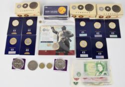 Nine Change Checkers and Royal Mint £2 coin packs including James Cook, D-Day, some round pounds, £1