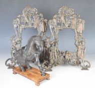 Pair of figural bronze photograph frames, height 32.5cm ,and a cast metal horse on wooden base