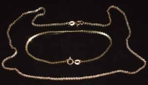 A 9ct gold necklace and bracelet made up of 'S' shaped links, 7.7g, 40cm, 17cm
