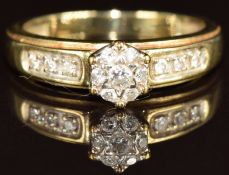 A 9ct gold ring set with diamonds in a cluster, 2g, size L
