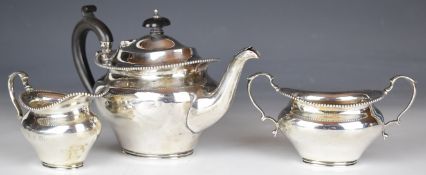 Edward VII hallmarked silver three piece bachelor's tea set with beaded edge, Birmingham 1910, maker
