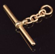 A yellow metal T bar (tests as 18ct gold), 8g