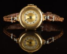 Edwardian 9ct gold ladies wristwatch with blued hands, black Arabic numerals, silver chapter ring,