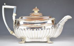 Georgian hallmarked silver three piece tea set with foliate decoration, reeded lower body and