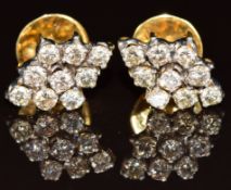 A pair of 18ct gold earrings each set with a marquise shaped cluster of diamonds, total diamond