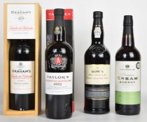 Four bottles of alcohol comprising Graham's Quinta dos Malvedos Port 2009, Dow's Master Blend Finest