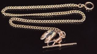 A 9ct rose gold pocket watch / Albert chain with T-bar and shoe charm, 17.2g, 38cm