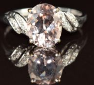 A 9k white gold ring set with an oval cut tourmaline and diamonds, 2.4g, size Q