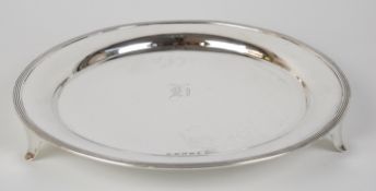George V Scottish hallmarked silver salver raised on three feet, Glasgow 1919, maker Lawson & Co,