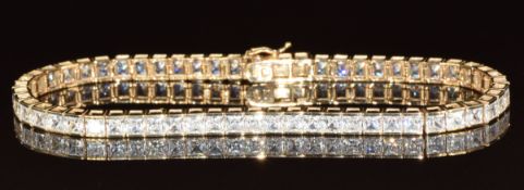 A 9ct gold bracelet set with cubic zirconia, 10.5g, 18.5cm