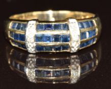 A 9ct gold ring set with calibre cut sapphires and diamonds, 2.4g, size K