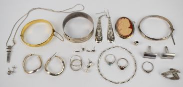 A collection of silver jewellery including five rings, Charles Horner bangle, two further bangles,