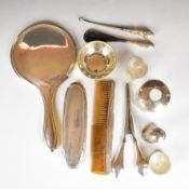 Hallmarked silver items to include a pair of napkin rings, pierced bowl, hallmarked silver lidded