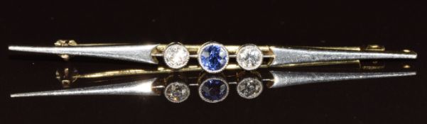 Art Deco 18ct gold brooch set with a purple / blue sapphire of approximately 0.2ct and two