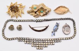 A collection of jewellery including Christian Dior brooch, Exquisite brooch set with tiger's eye,