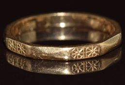 An 18ct gold octagonal ring with engraved decoration, 1.8g, size K