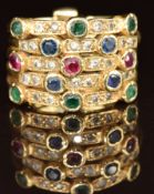 An 18ct gold ring made up of five rings set with rubies, emeralds, sapphires and diamonds, 7.7g,