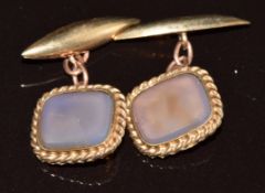 A pair of 9ct gold cufflinks set with blue agate, 6.3g