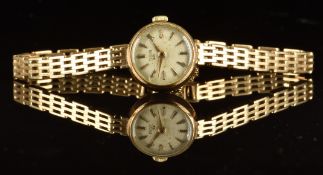Tudor 9ct gold ladies wristwatch with gold hands and hour markers, silver dial, case signed 'Made