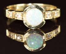 A 14k gold ring set with a synthetic opal and diamonds, 2.9g, size O
