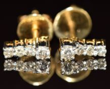 A pair of 18k gold earrings set with diamonds, 1.8g