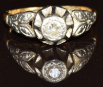 An 18ct gold ring set with a diamond of approximately 0.1ct in a platinum setting, 2.9g, size J