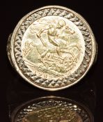 A 9ct gold ring set with a 1982 gold half sovereign, the shoulders decorated with eagles, 8.3g, size