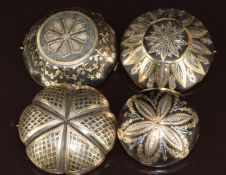 Three Victorian tortoiseshell brooches and one button with inlaid gold and silver decoration