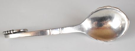 Georg Jensen spoon with scroll handle, import marks for London 1926 and also with maker's mark and
