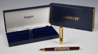Burberrys fountain pen with typical patterned body and 14k 585 gold nib, in original box