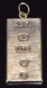 A 9ct gold ingot pendant, 13.8g, 3.6cm