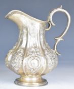 Victorian hallmarked silver milk jug, with lobed and embossed decoration, Sheffield 1852, maker