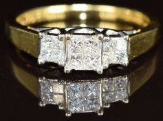 An 18k gold ring set with princess cut diamonds, the total diamond weight 0.33ct, 3.4g, size L