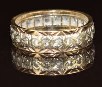 A 9ct gold eternity ring set with spinel, 3.1g, size K