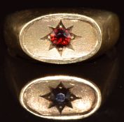 A 9ct gold ring set with a garnet in a star setting, 5.9g, size X