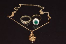 Two 9ct gold rings, one set with paste surrounded by cubic zirconia (size M) and the the other a