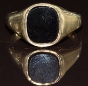 A 9ct gold signet ring set with onyx, 7.7g, size W