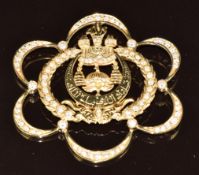 An 18k gold pendant/ brooch set with diamonds, 16.9g, 5.5 x 5cm