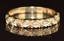 A 9ct gold half eternity ring set with diamonds, 2.1g, size O