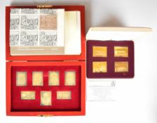 Hallmarked silver and silver gilt stamp ingots comprising limited edition (1299/5000) Coronation