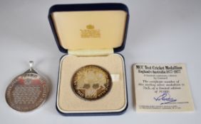 Two hallmarked silver medallions, one limited edition (543/10,000) to commemorate the centenary