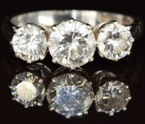 A platinum ring set with three round cut diamonds of approximately 0.8ct, 0.38ct and 0.44ct, 4.4g,