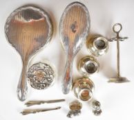 Hallmarked silver mounted items to include hand mirror, brushes, candlesticks, manicure set or hat