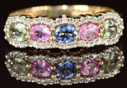 A 9k gold ring set with oval cut green, pink and blue sapphires surrounded by diamonds, 2.6g, size