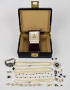 A collection of jewellery including two strands of cultured pearls one with a 9k gold clasp,